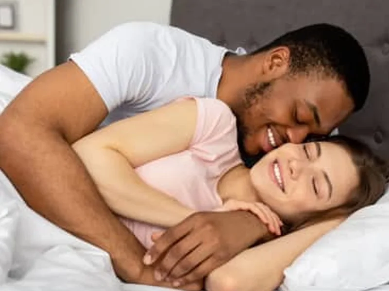 A couple close and content at home